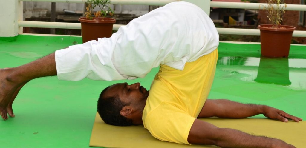 Learn yoga Halasana Plow posture read in Fine dining Indian magazine
