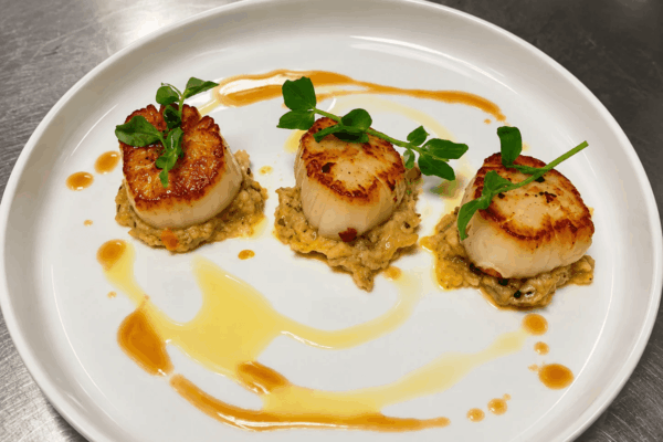 Seared Scallops, Truffle-Scented Bubble and Squeak, Lobster Dressing