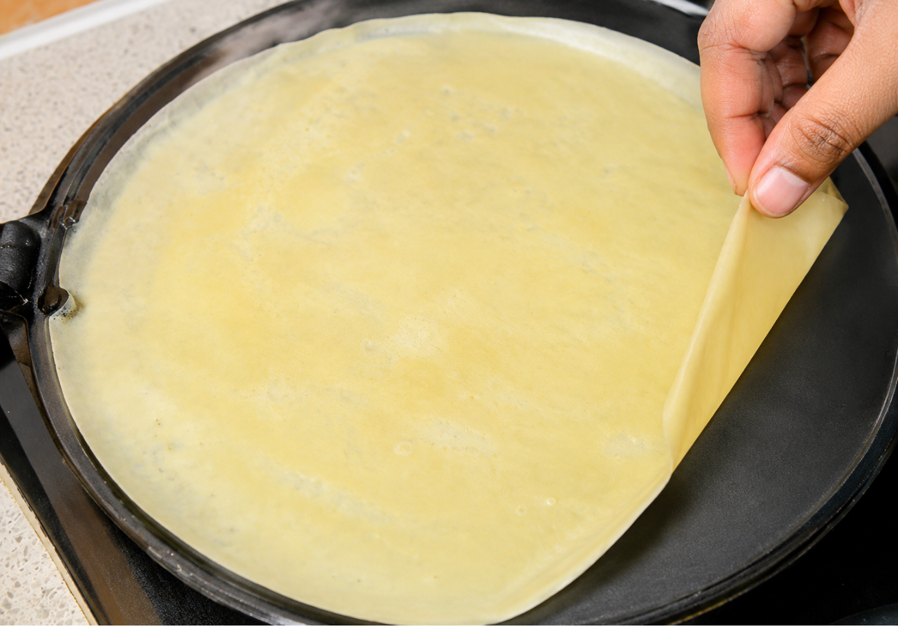 Whisk the crepe batter until smooth, thin and free from lumps.