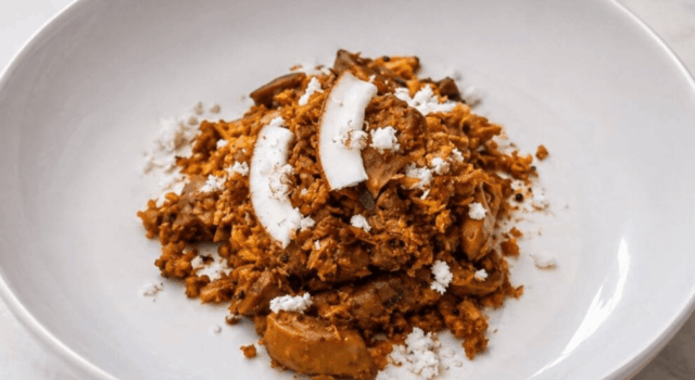 Finished Chicken Gizzard Thoran – Featured Image Kerala chicken gizzard thoran with grated coconut and fresh coconut slices