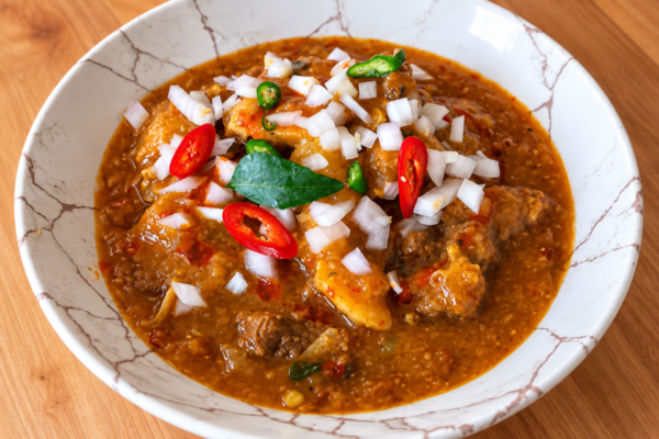 Kerala kappa beef curry with tapioca beef onion chilli and curry leaves