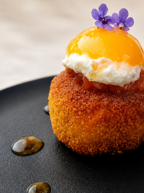 Vegetable tikki recipe with smoked tomato chutney and fried egg yolk