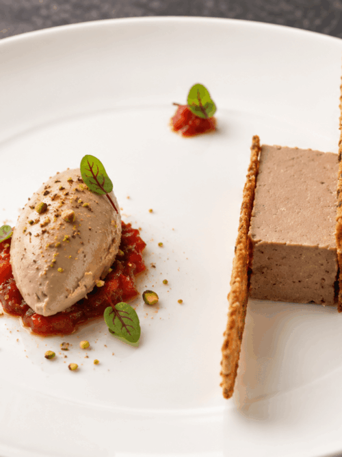 Indian-spiced chicken liver parfait served with tomato chutney and crisp bread