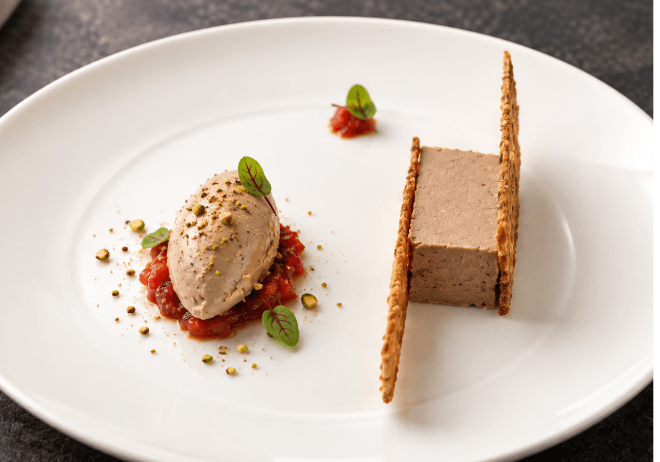 Indian-spiced chicken liver parfait served with tomato chutney and crisp bread