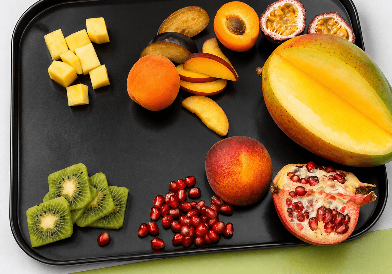 Fresh seasonal fruits prepared for fruit chaat recipe