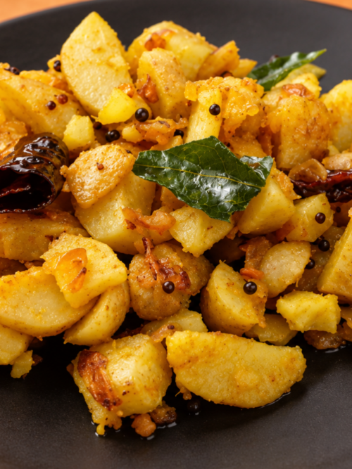 Chinese potato recipe Kerala koorka mezhukkupuratti with curry leaves and spices