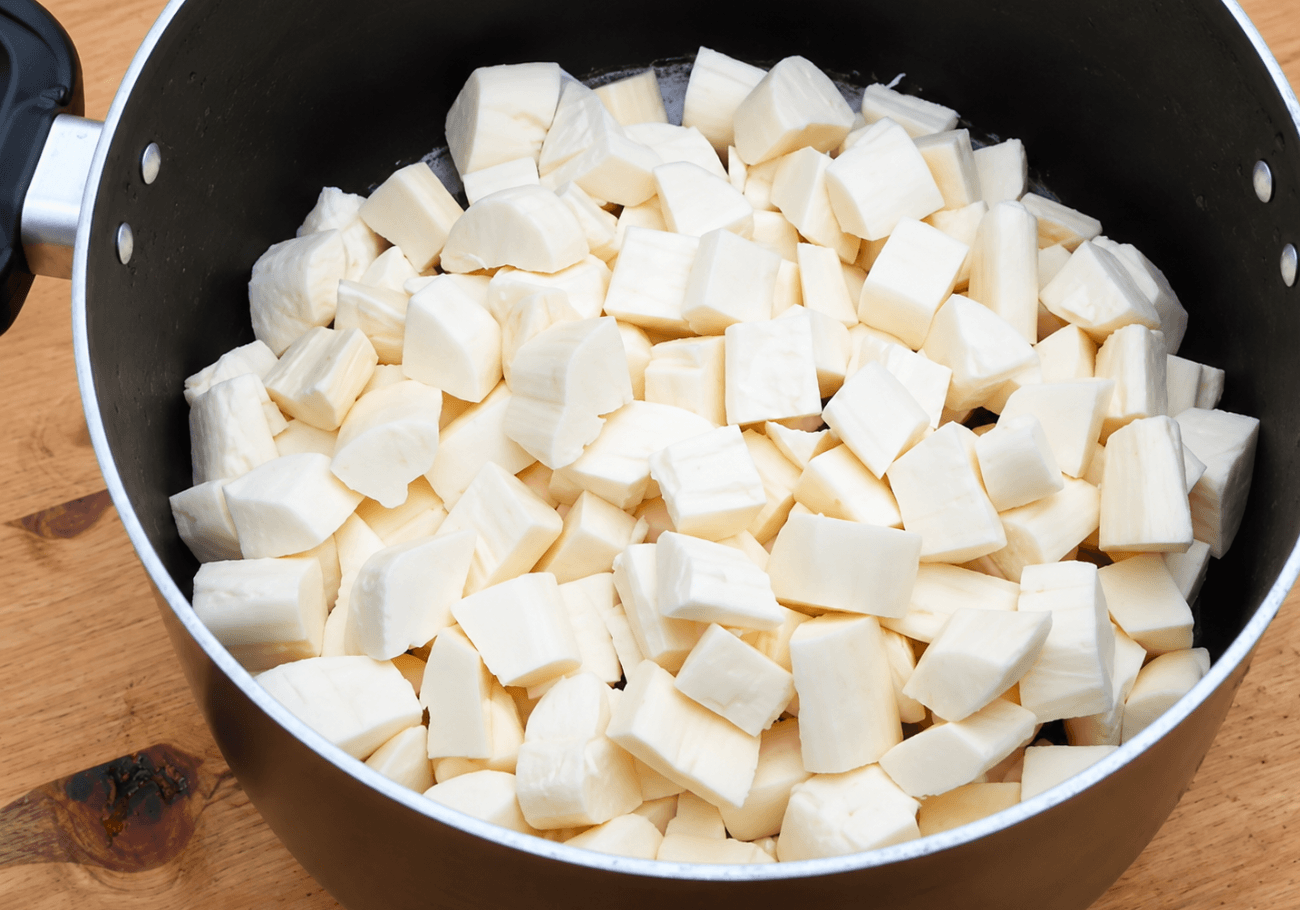 Raw cassava pieces prepared for Kerala tapioca recipe