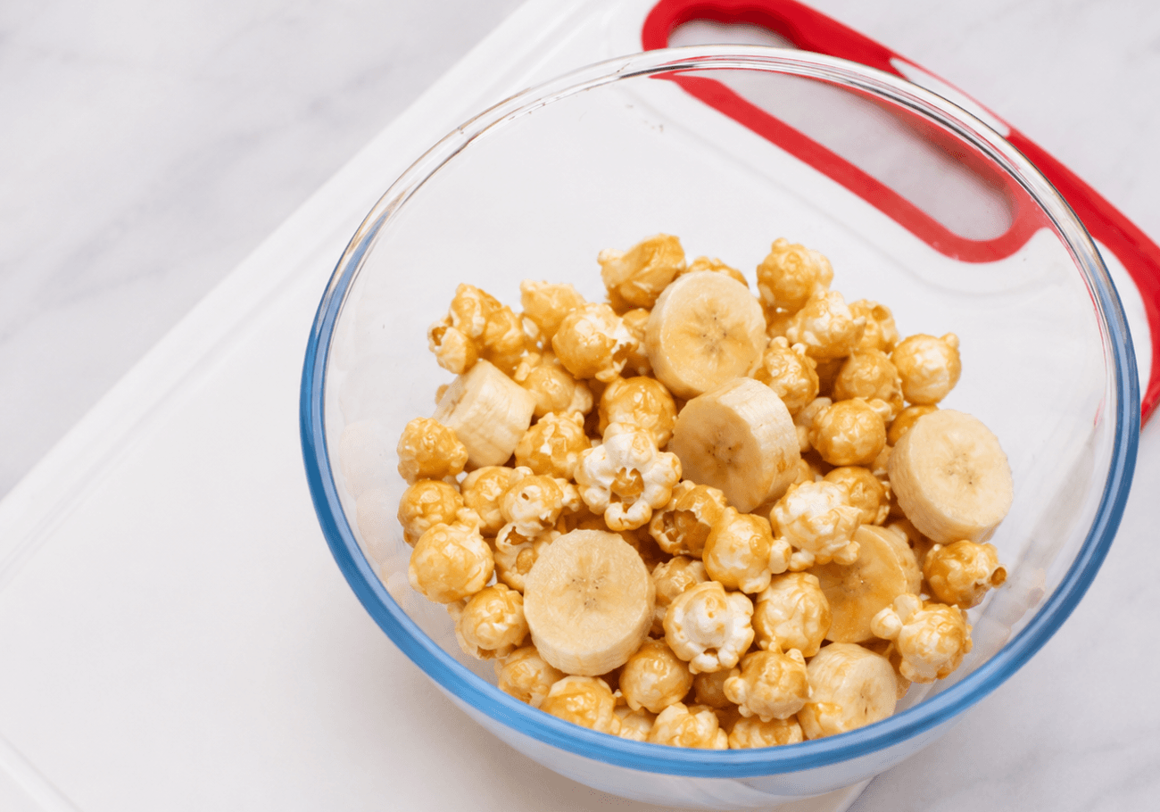 Popcorn and milk prepared for healthy banana milkshake